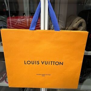 Authentic Louis Vuitton Orange Shopping Bag with Blue Handles Measures 13 x 16